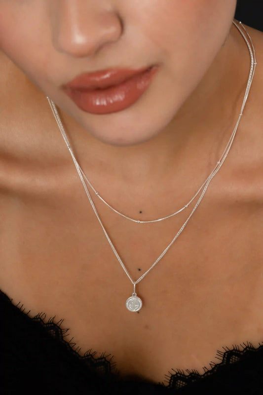 Dije Mini San Benito 1cm Plata ley 925