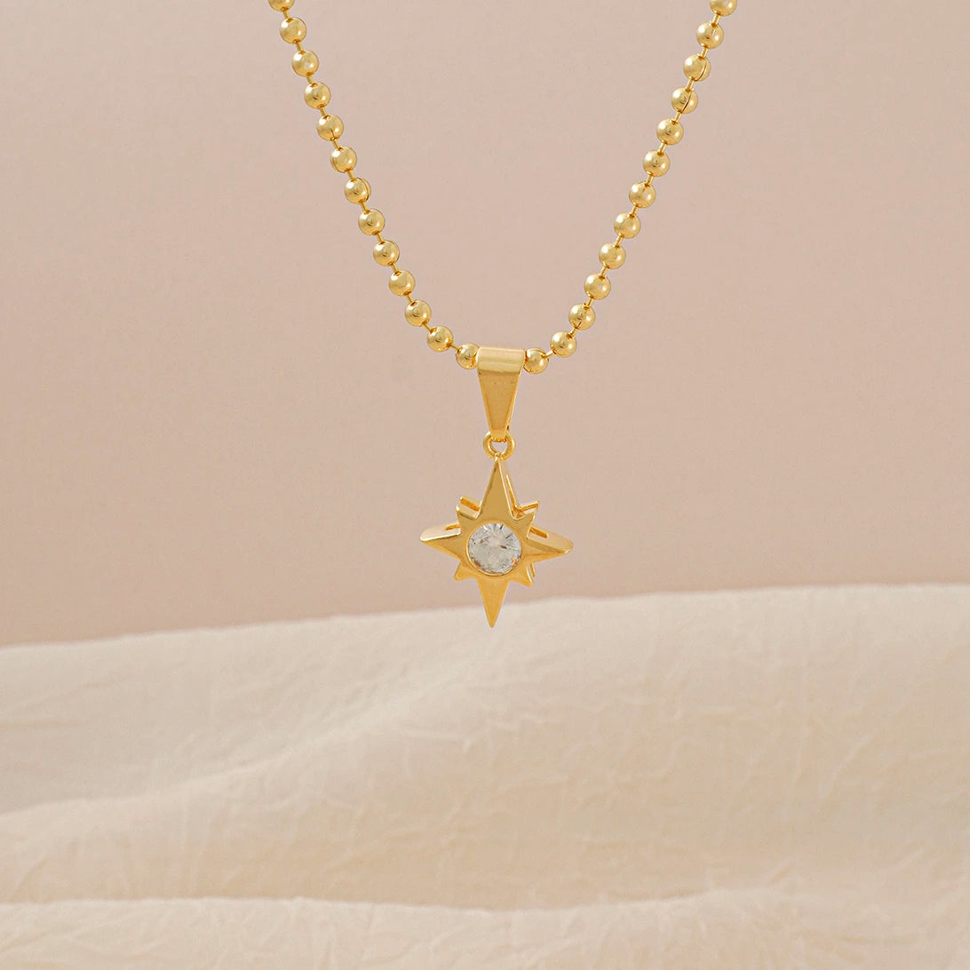 Dije Estrella circonia Oro laminado