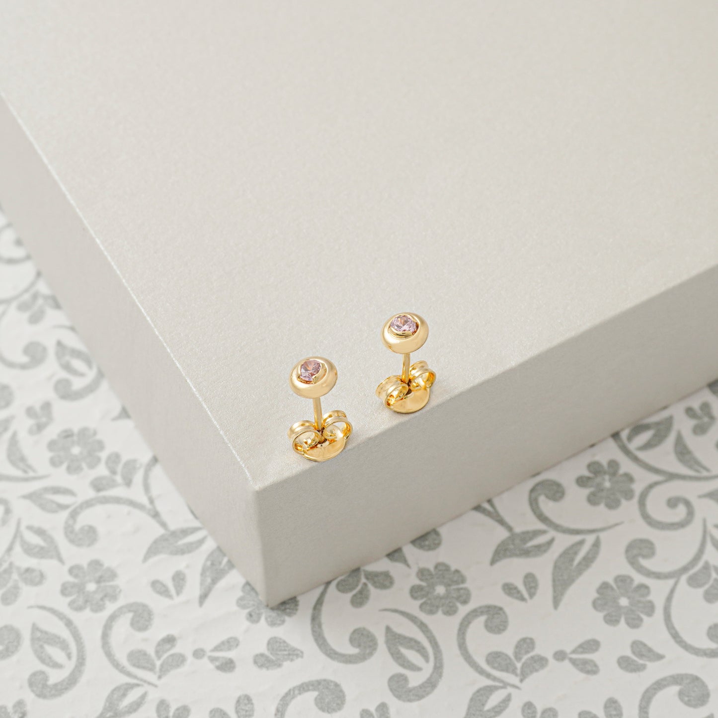 Arete Circon Caja Redonda 4mm Rosa Oro laminado