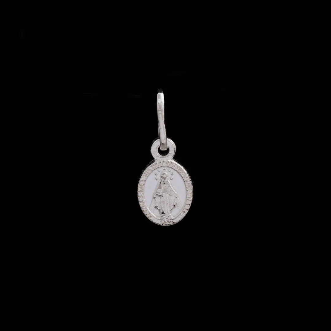 Dije Mini Milagrosa XS 0.8cms Plata ley 925
