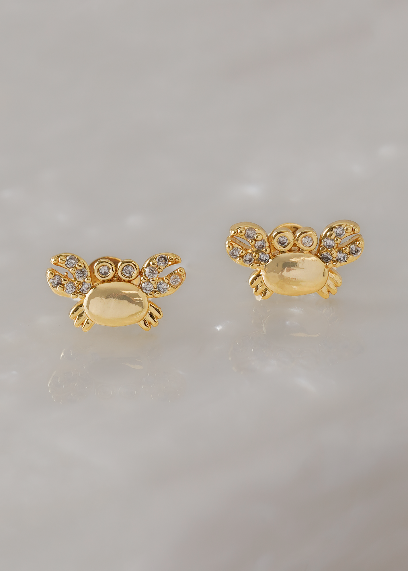 Arete Crab Circonias Oro laminado