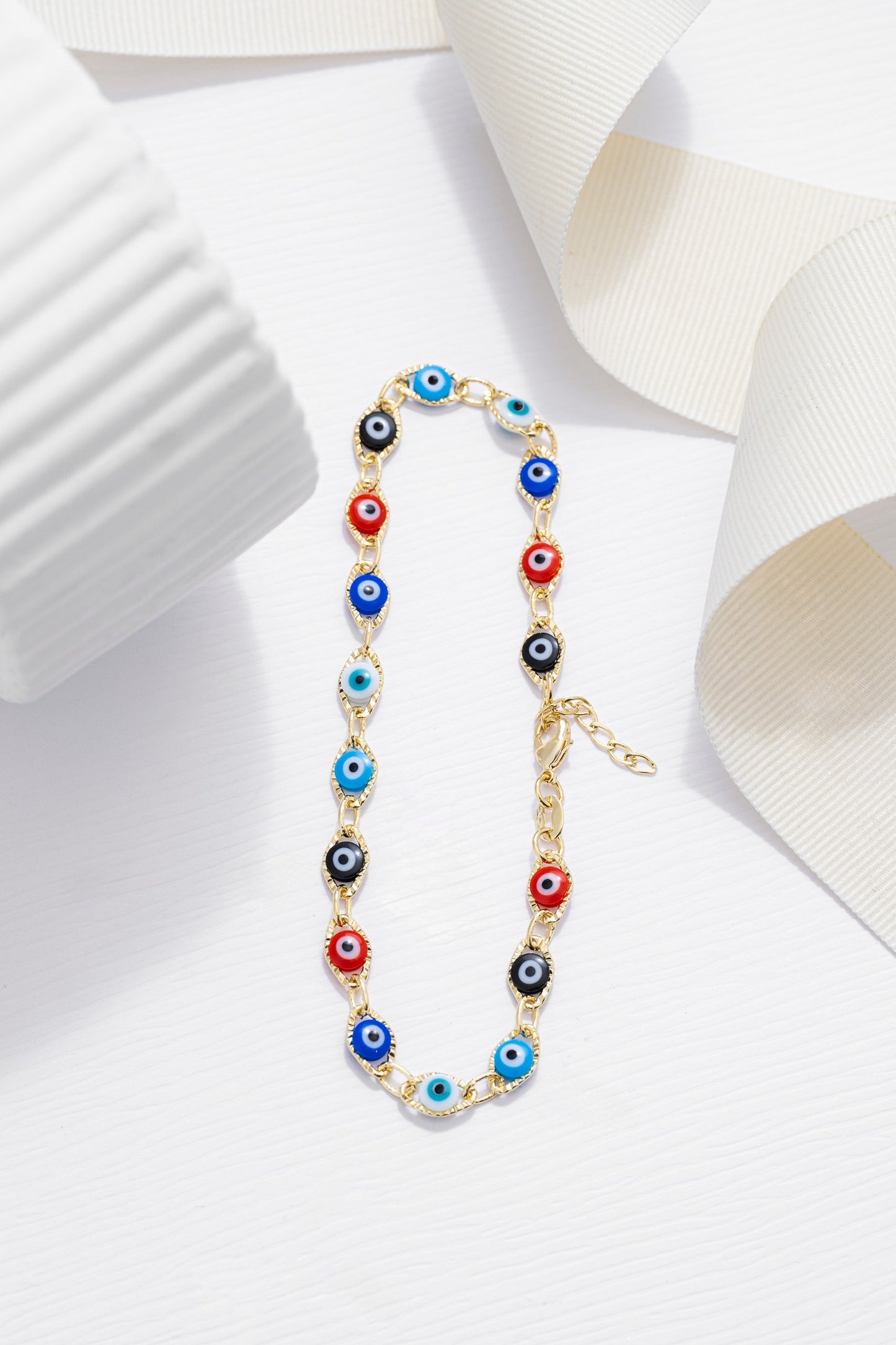 Tobillera Ojo Turco Multicolor 23 cms + 2 cms extensor Oro laminado